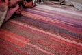 The Red Threads Weaving - For Nina